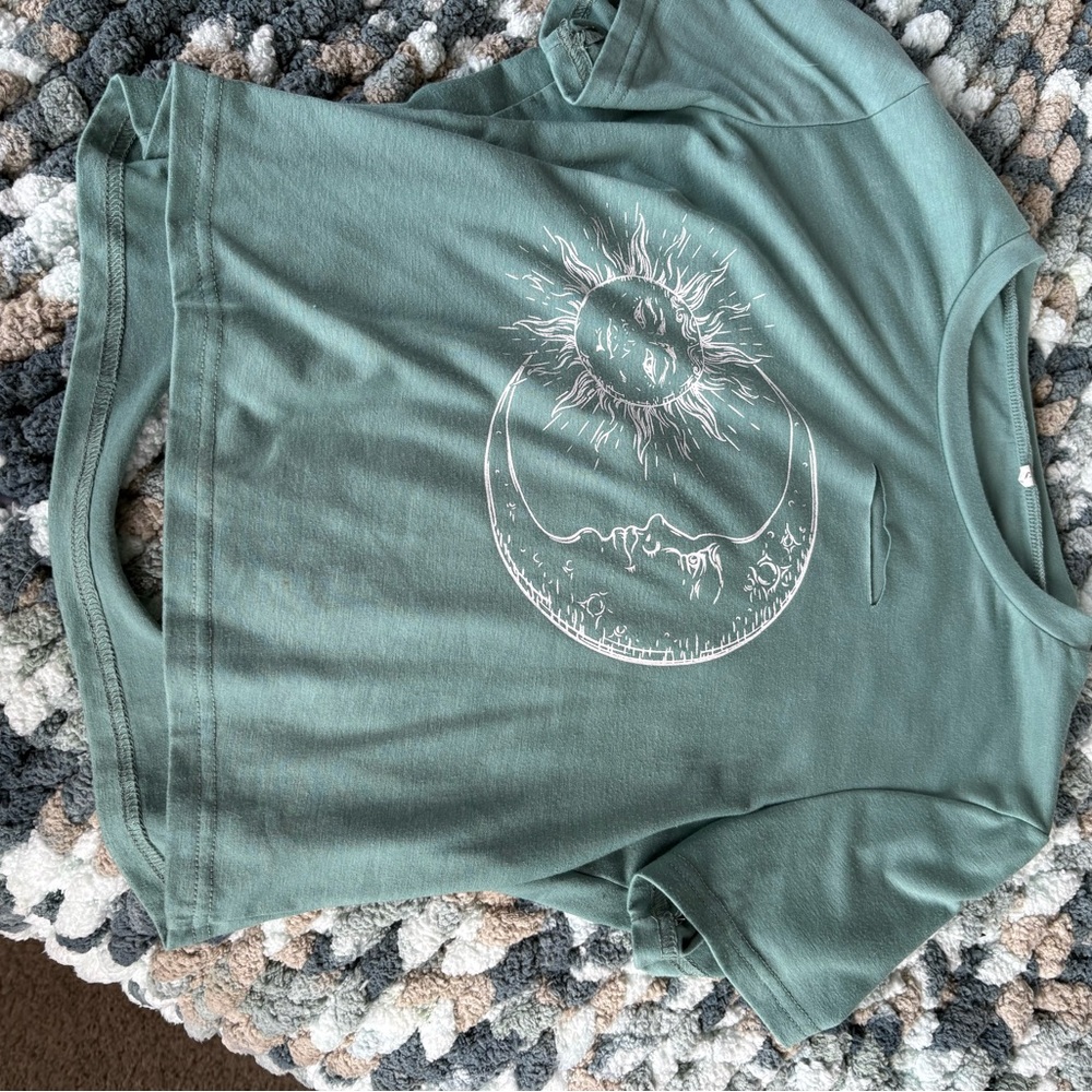 Green Graphic Tee with Sun and Moon Design